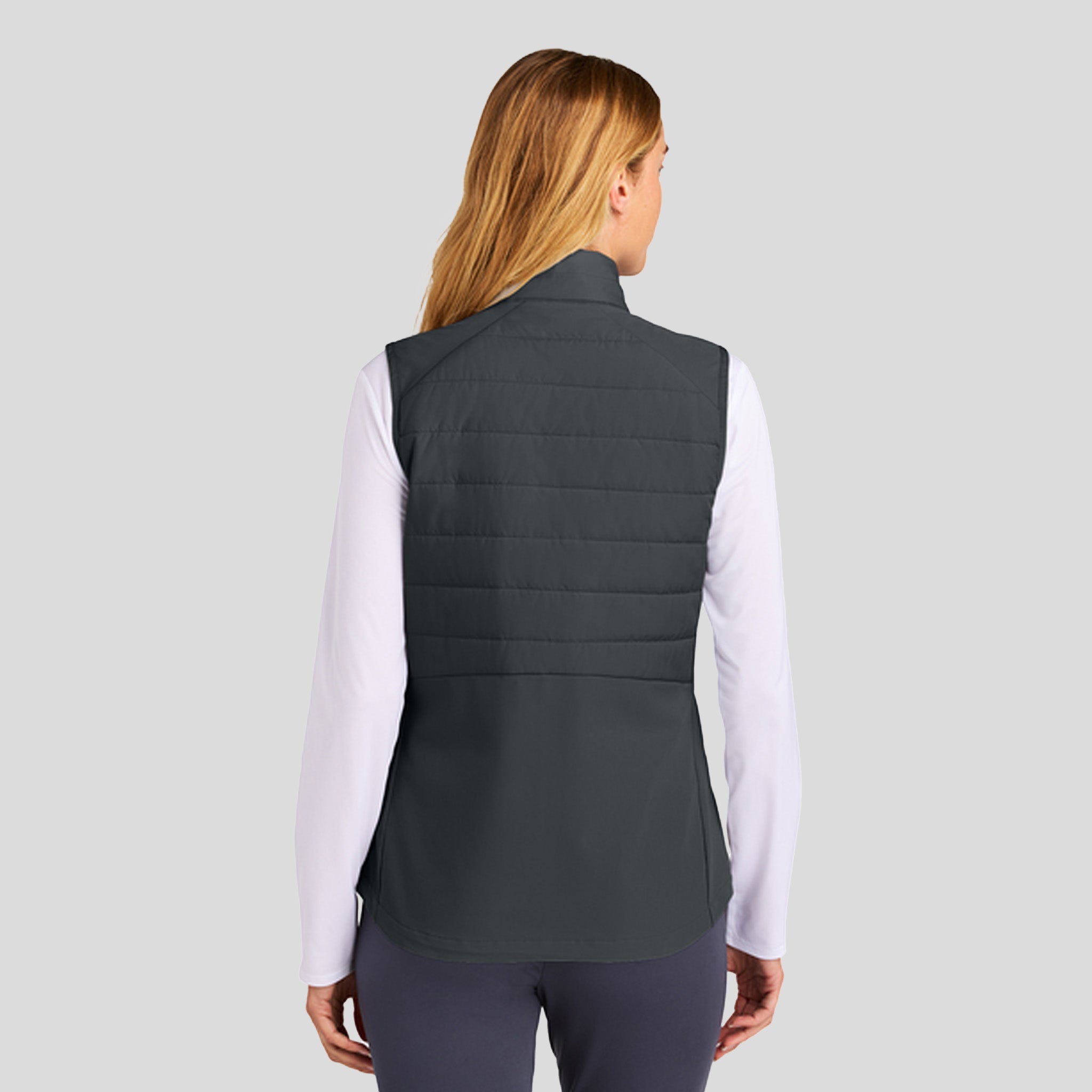 Womenโs Teknical Hybrid Vest | Iron Grey