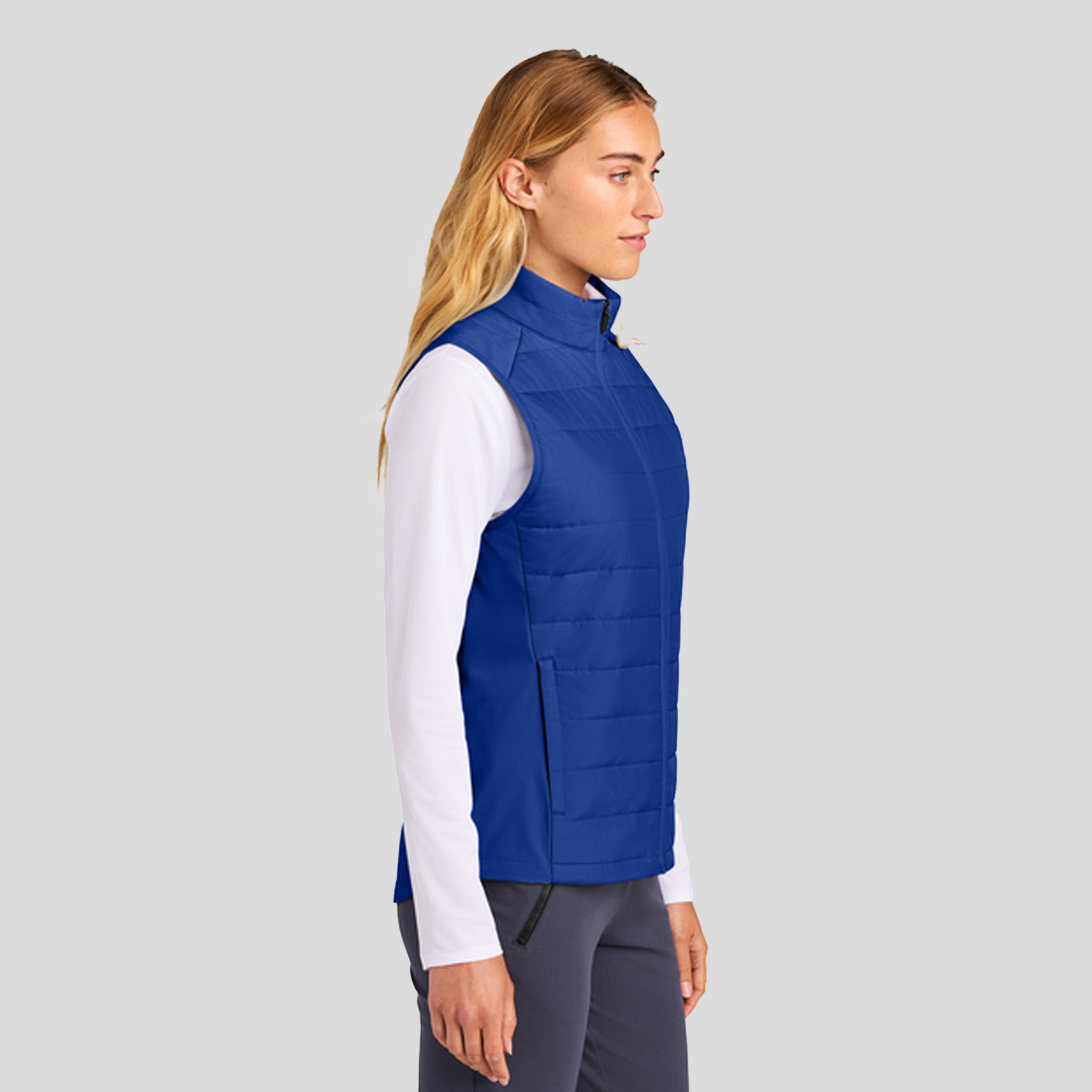 Womenโs Teknical Hybrid Vest | True Royal